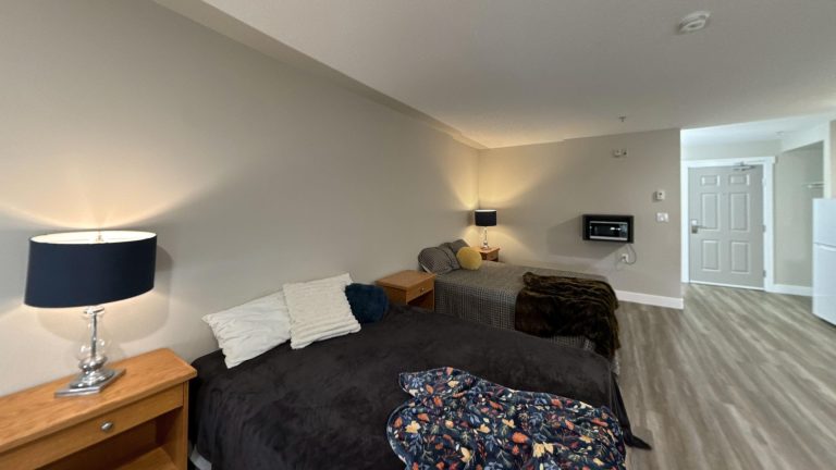 2-Queen-Beds-Studio-Whitecourt-1-Living-Room 2